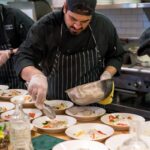 man cooking in kitchen