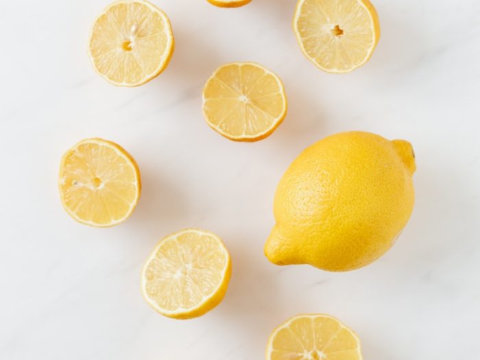 Fresh Lemons on a Marble Surface