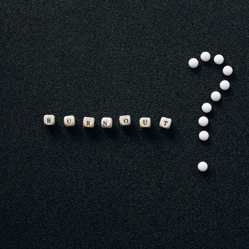 Letter Beads on Black Surface