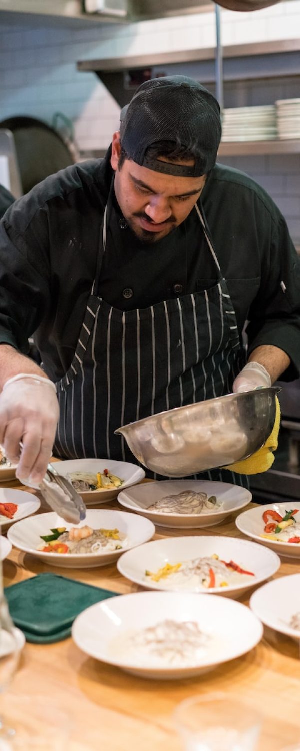 man cooking in kitchen